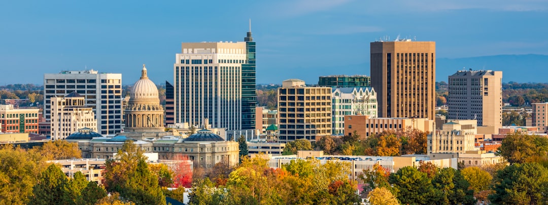 Downtown city skyline with autumn trees in the foreground